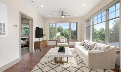 a living room with a couch and a tv