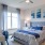 a bedroom with a bed and a table