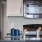a microwave oven and a refrigerator in a kitchen