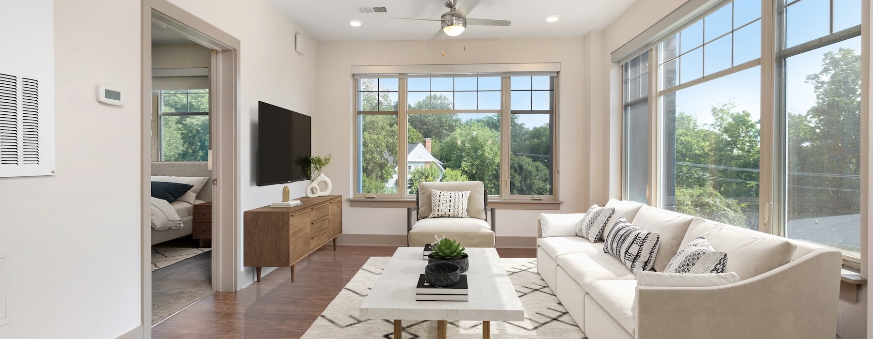 a living room with a couch and a tv
