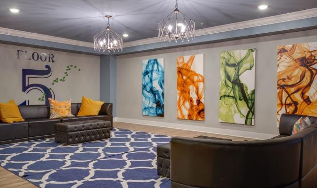 The essence of exceptional living a room with a couch and a table with a painting on the wall