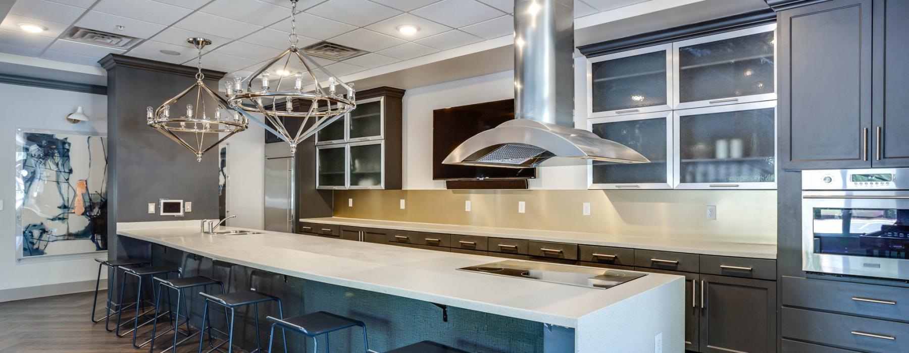 a kitchen with blue stools