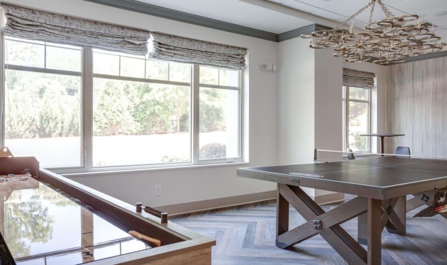 a room with a table and chairs