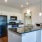 a kitchen with white cabinets
