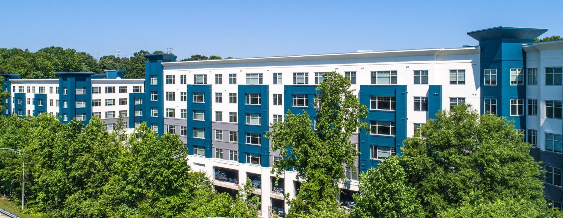 a building with trees in front of it