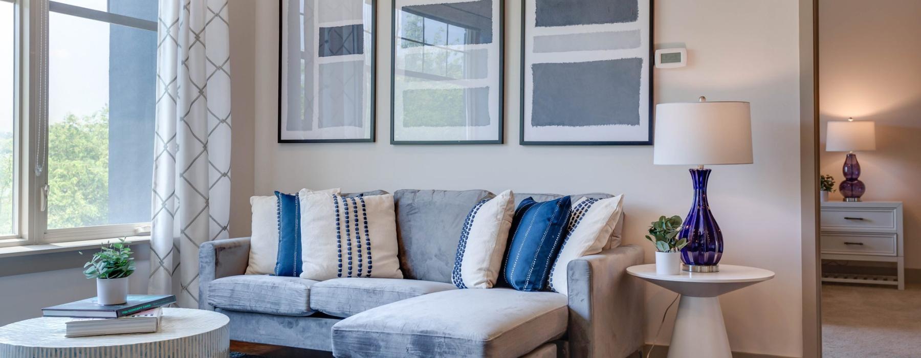 a living room with a couch and a table